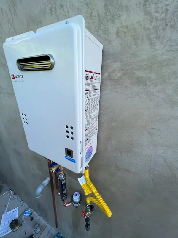 Tankless water heater installation for Montrose Village homes